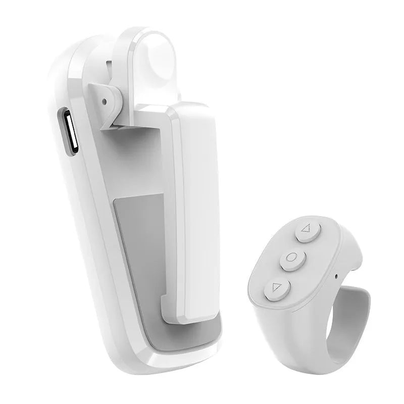 Smart wireless page turner remote control and finger clicker for e-readers in black, white, or pink.
