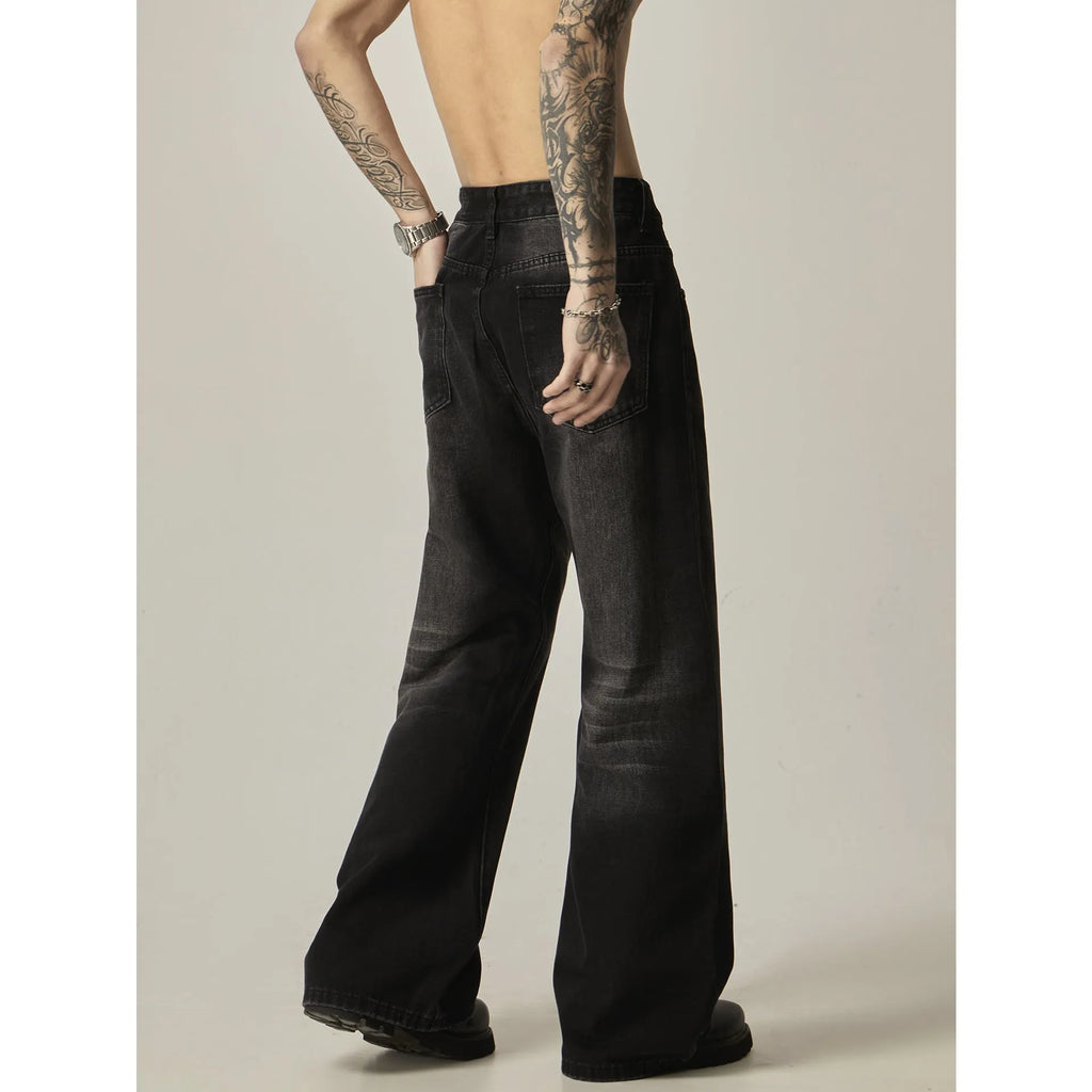 Black loose straight retro jeans with zipper fly on size chart background
