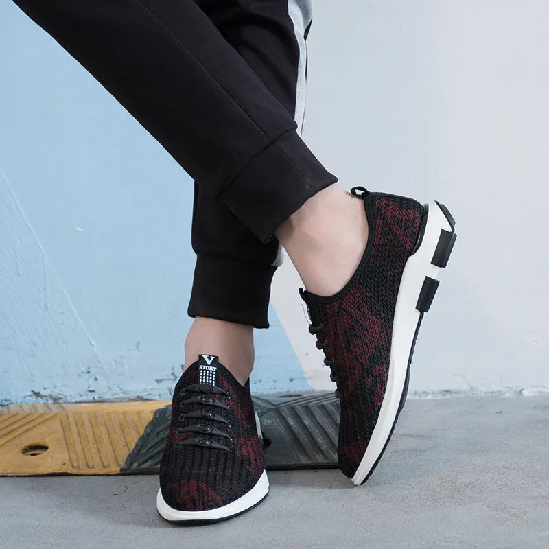 Men's breathable Lycra casual shoes in black with slip-on design, round toe, and flat rubber sole