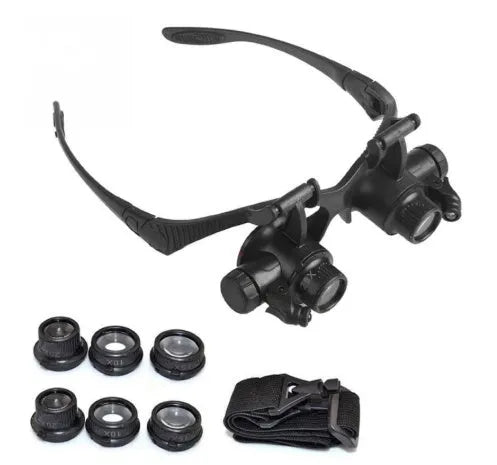 Black hands-free magnifying glasses with LED lights and multiple interchangeable lenses for precision repair work.