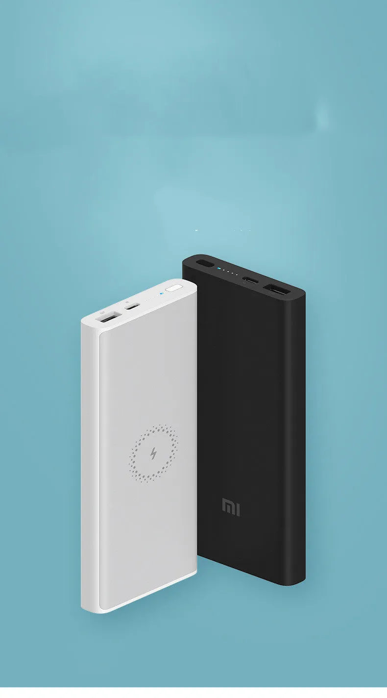 White and Black coloured 10000mAh portable power bank with wireless charging pad and USB ports.