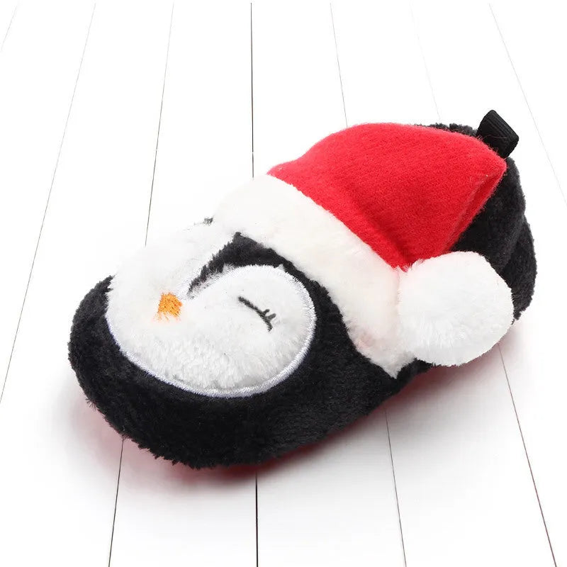 Toddler coral fleece shoes with non-slip sole in Christmas penguin design, low tube sleeve style