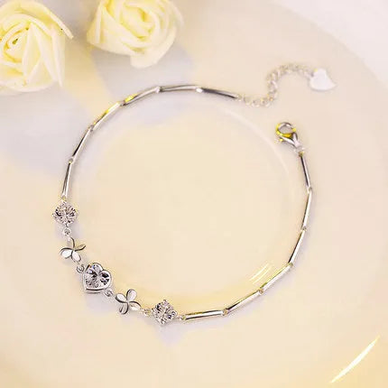 S925 sterling silver bracelet with heart-shaped clover pendant, white finish, 7mm x 7.3mm motif, 15cm plus 3cm extension chain