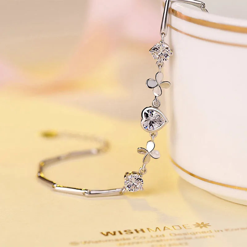 S925 sterling silver bracelet with heart-shaped clover pendant, white finish, 7mm x 7.3mm motif, 15cm plus 3cm extension chain
