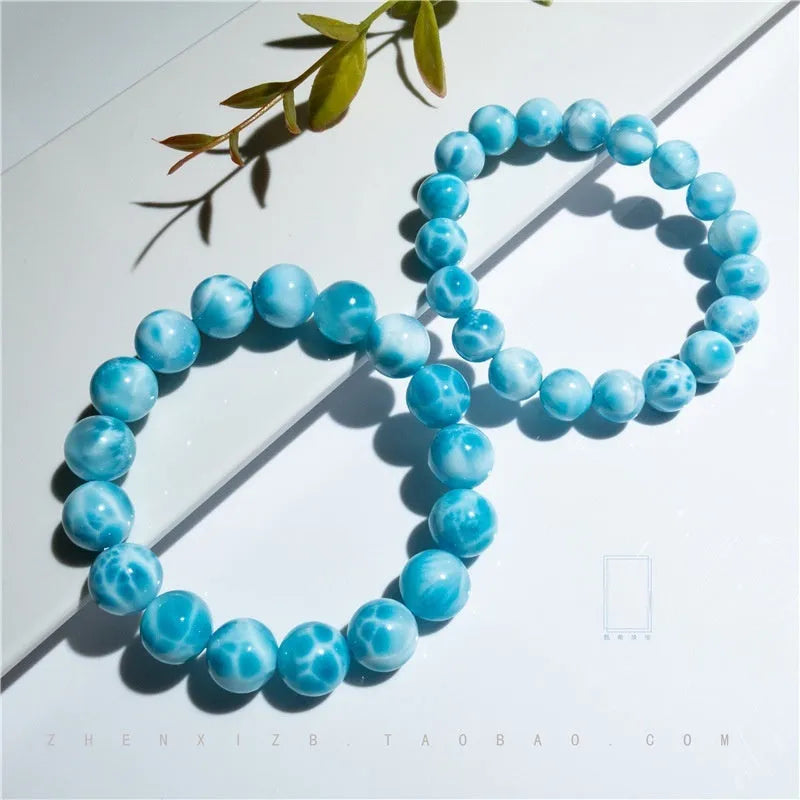Blue bodhi bracelet with natural sea-pattern crystal stones and pearl accents in Maillard style