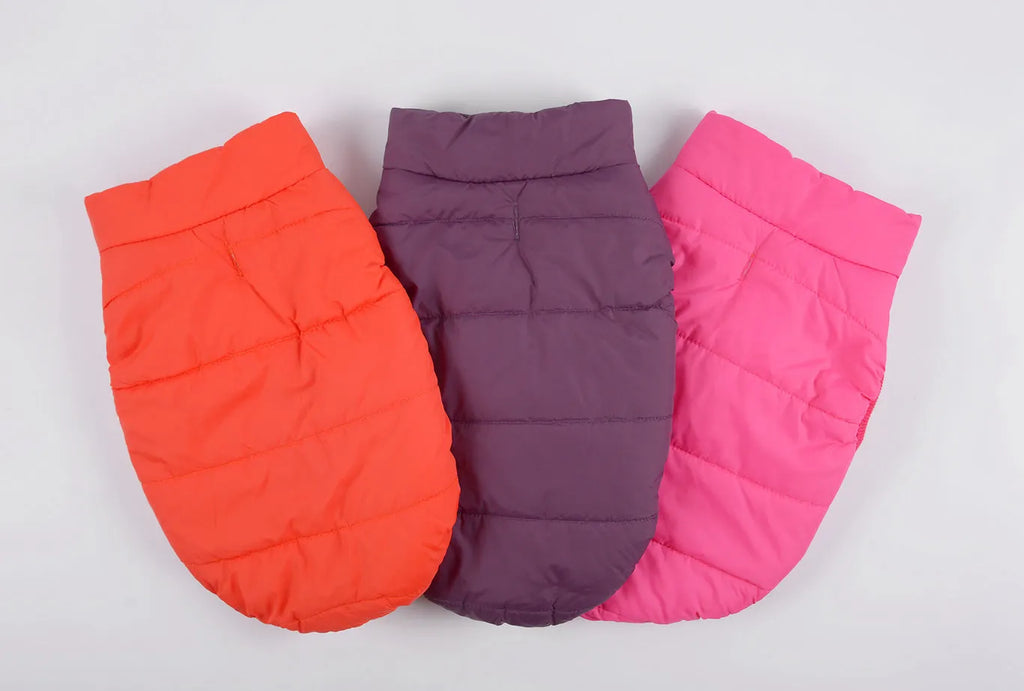 Waterproof polyester dog jacket in brown laying flat showing front view with zip closure