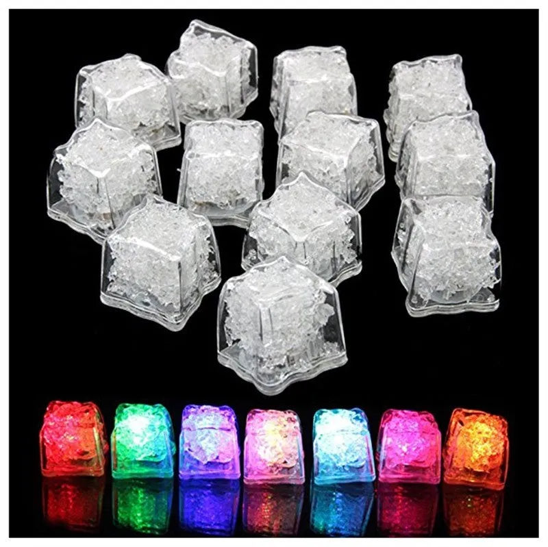 Square food-grade LED light ice cube glowing in a clear drink with colourful illumination