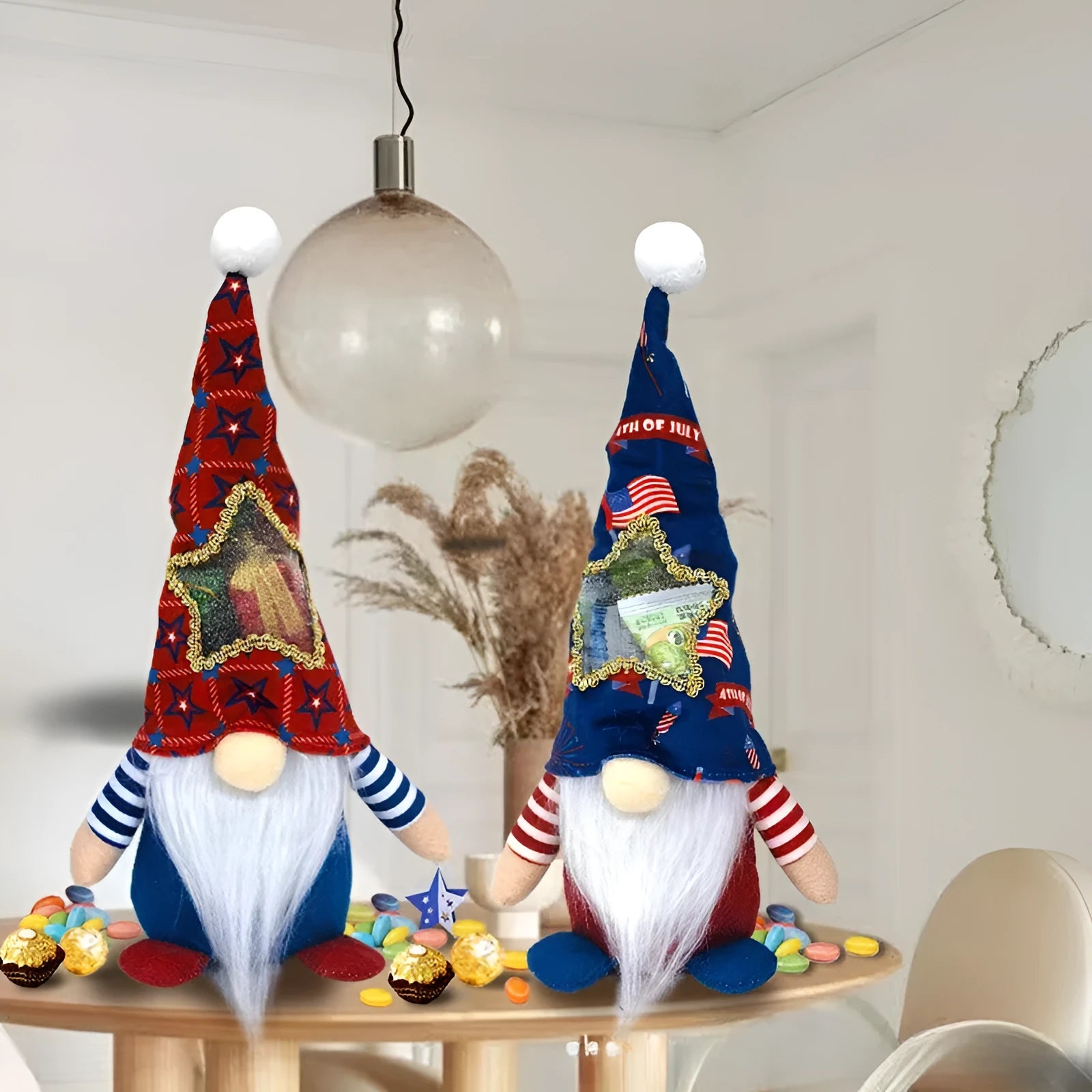 Two faceless baby doll Christmas decorations in suit costumes with Rudolf sack design