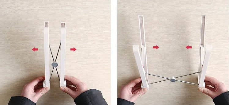 White portable laptop bracket with heat sink base in folded position.