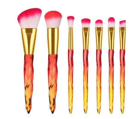 Ten crystal handle foundation brushes with artificial fibre bristles in a set, showing colour options.