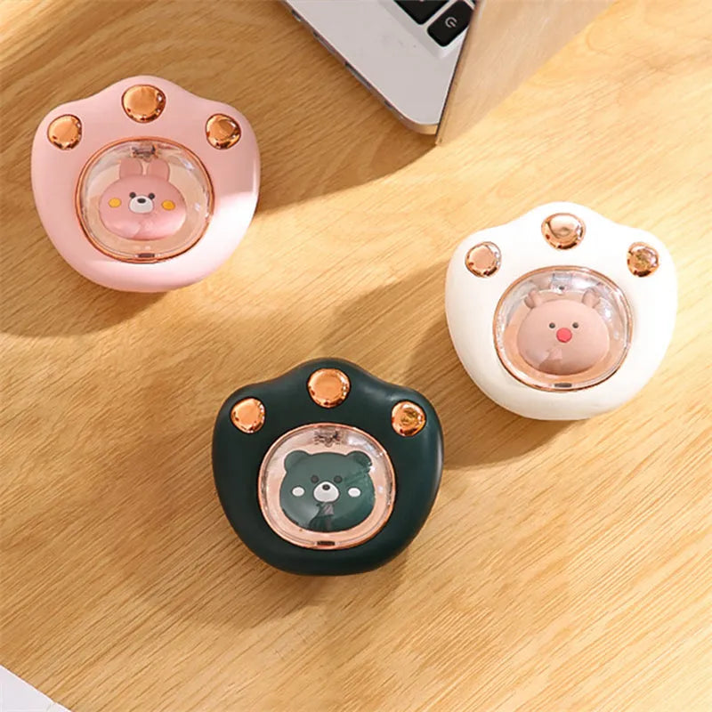 Mini electric hand warmer in cat paw shape, USB rechargeable, in white colour option, palm-sized
