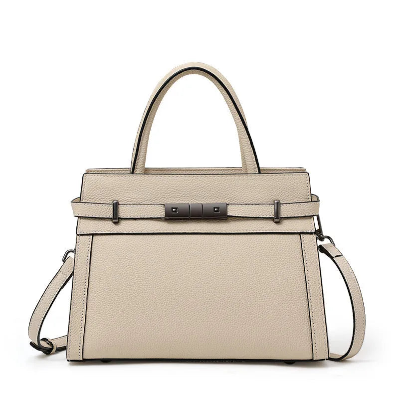 Genuine leather clamshell crossbody handbag for women with multiple internal compartments in five colour options.
