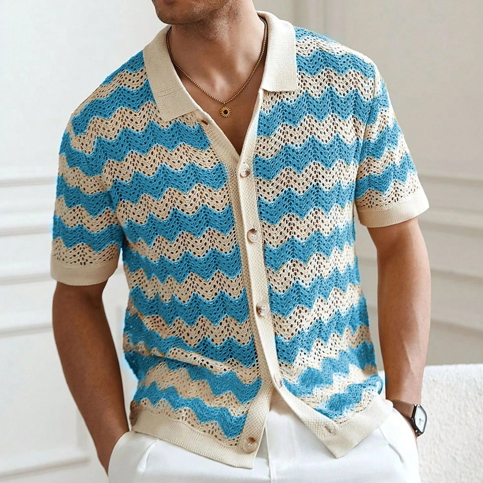Short sleeve corrugated knit sweater in blue, brown, or yellow with a textured hollow jacquard and flocking design.