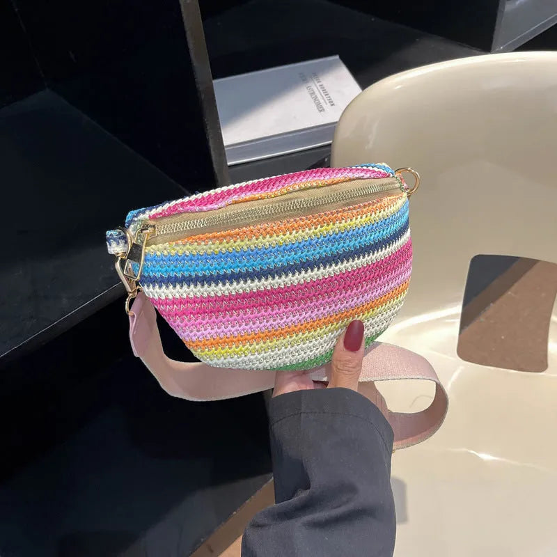 Bohemian style straw women's shoulder bag with shell shape and single strap in pink or blue colour