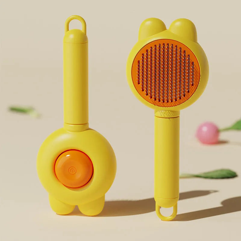Self-cleaning pet grooming brush with release button in four colour options