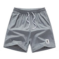 Men's straight cut summer shorts with a drawstring waist in black, blue, gray, or khaki.