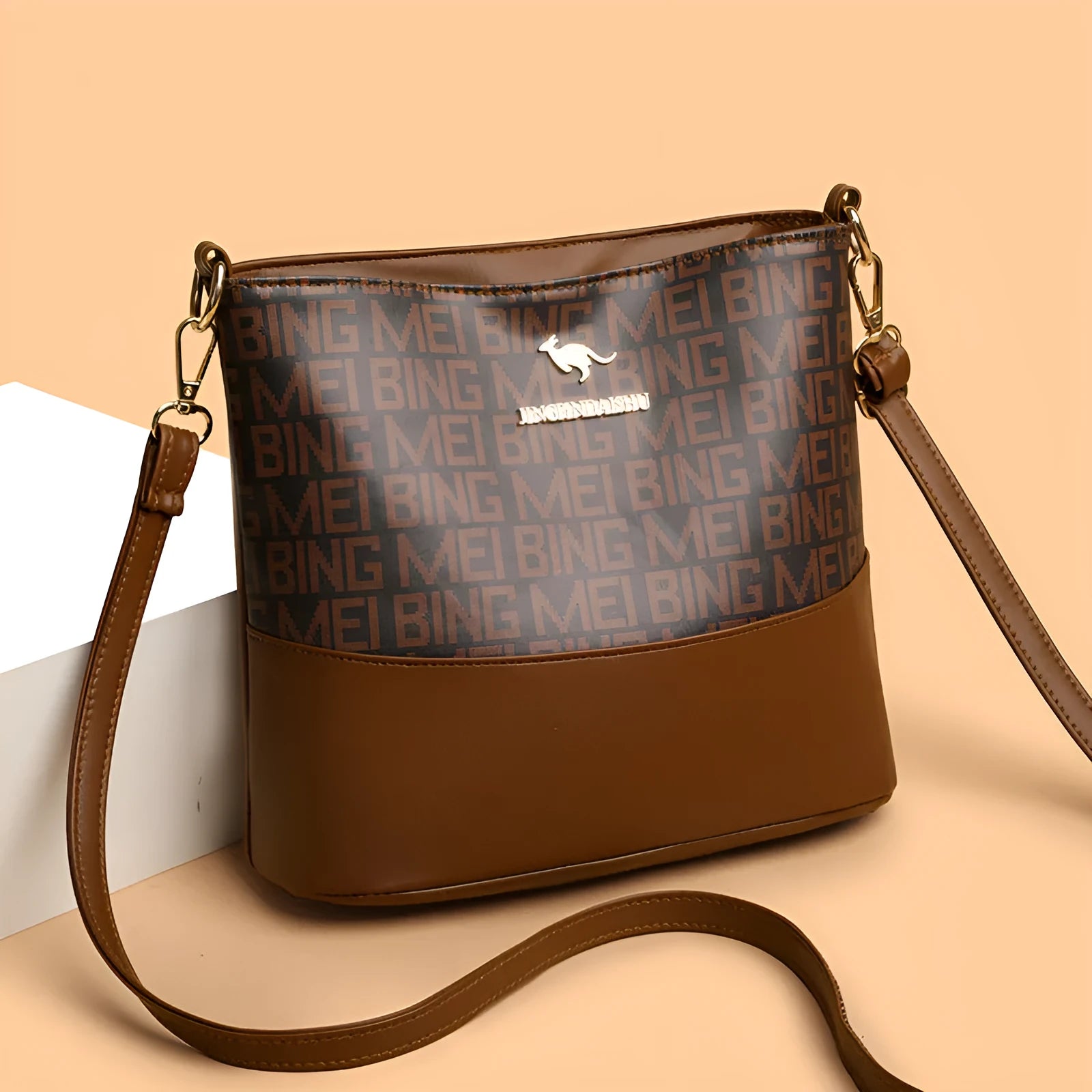 Brown soft leather messenger bag with front pocket and shoulder strap