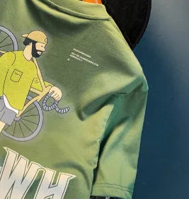 Green men's loose fit T-shirt with a printed literary youth design on the front.