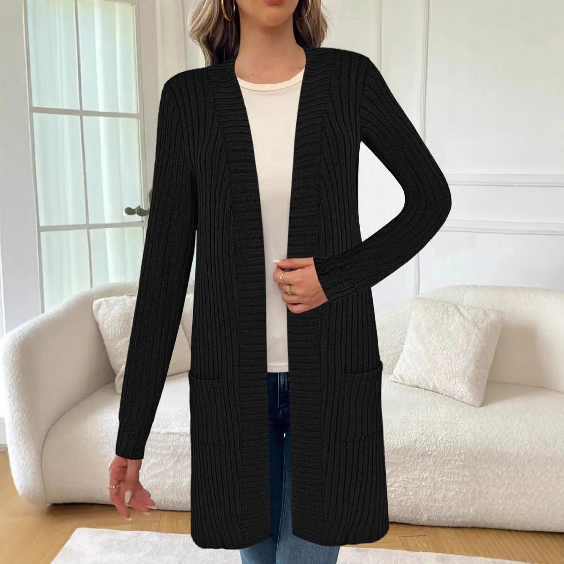 Long sleeve loose fit knitted cardigan jacket with pockets shown in black, grey, or wine red.