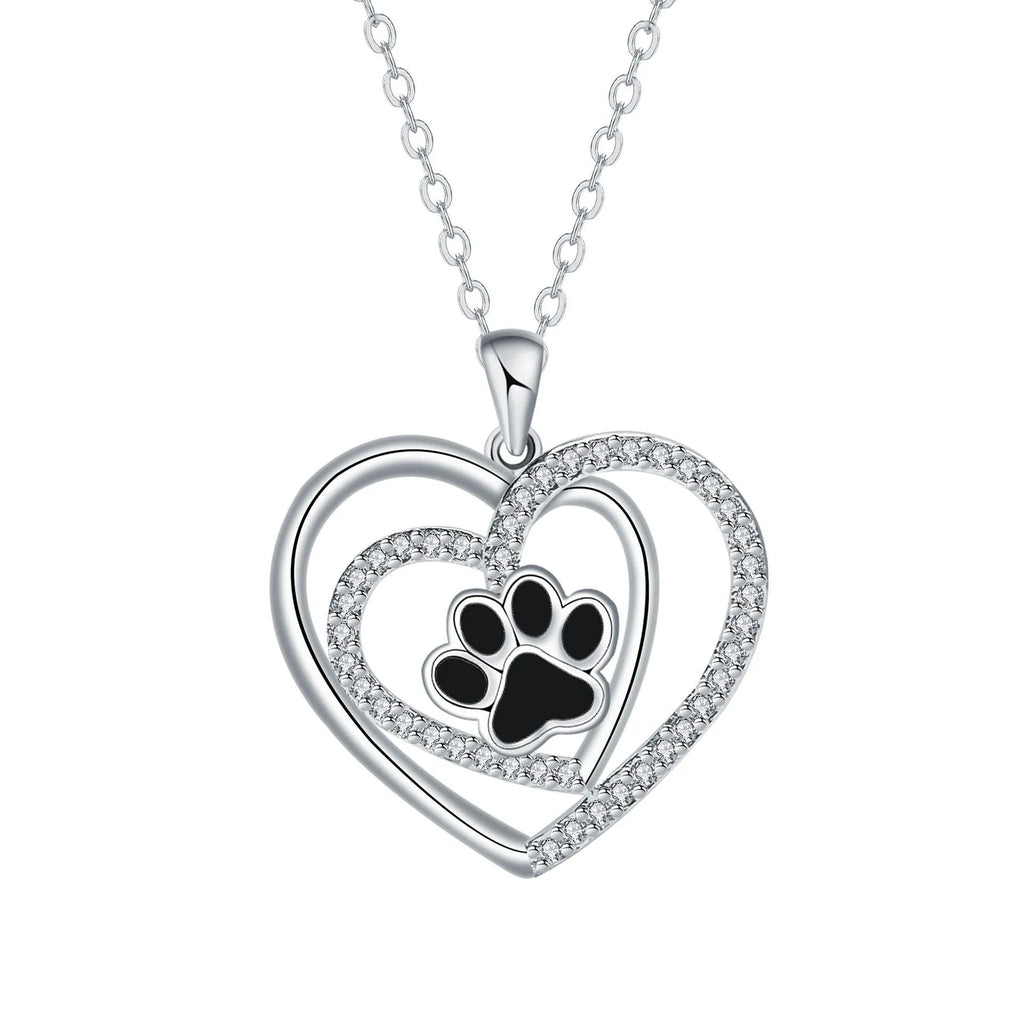 Women's necklace with heart-shaped dog paw pendant on cross chain