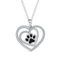 Women's necklace with heart-shaped dog paw pendant on cross chain