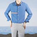 Hong Kong style loose fit shirt cardigan in a cotton blend fabric, shown in a light blue colour.