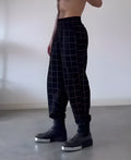 Men's plaid trousers with detachable apron in relaxed fit with belt and pockets