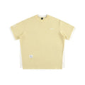 Loose fit grey waffle knit t-shirt with retro alphabet embroidery on the front.