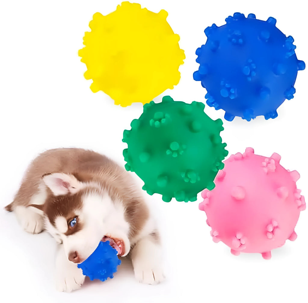 Four brightly coloured spiky dog toy balls with paw-print dimples, shown next to a small dog.