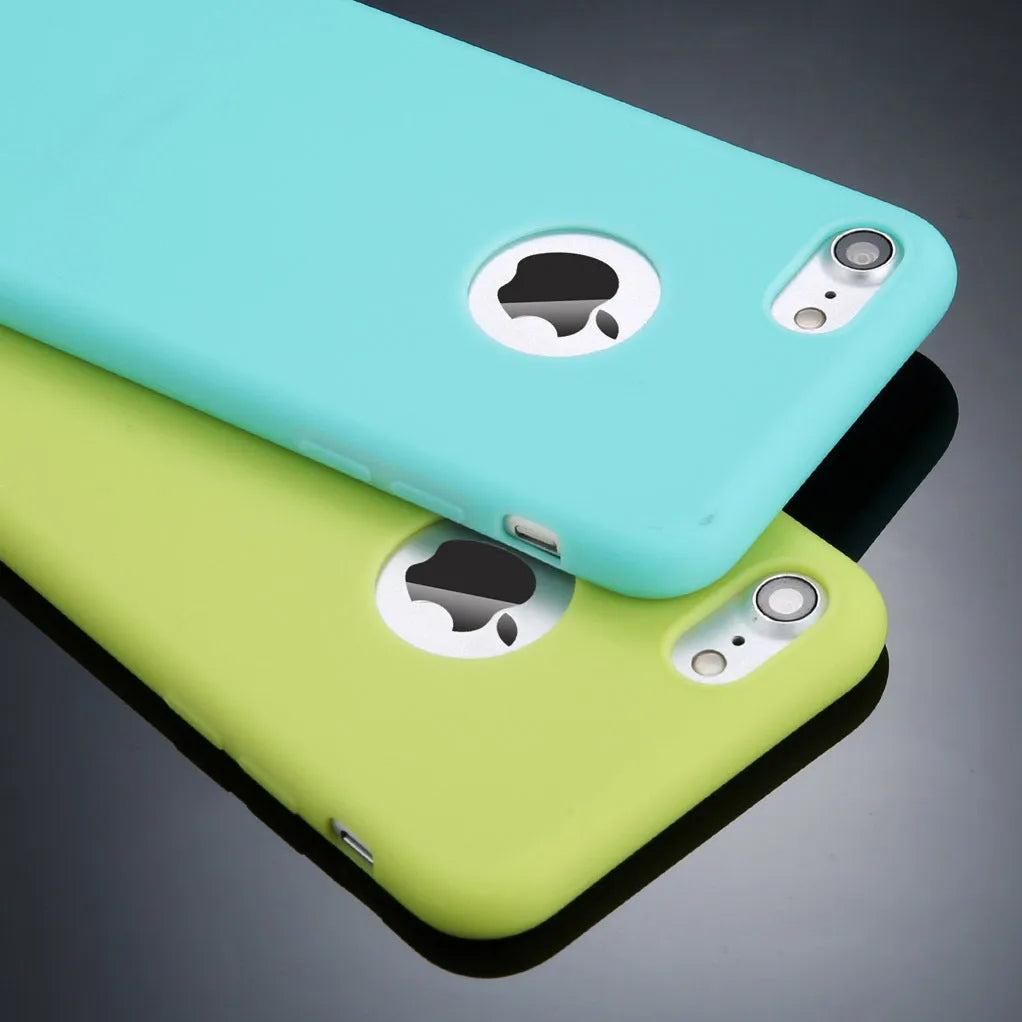 Soft silicone candy colour phone case for iPhone models on a plain background