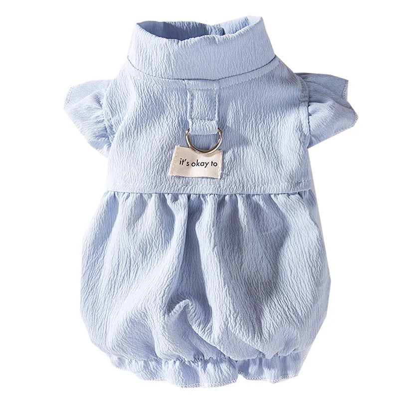 Solid colour polyester dog vest with flying sleeves in Bondi Blue on a small dog