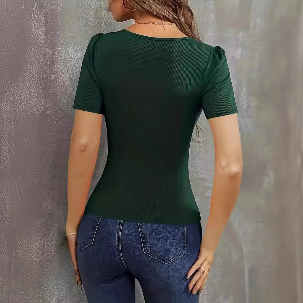 Women's wine red knitted short sleeve pullover with low neckline and slim fit on a hanger