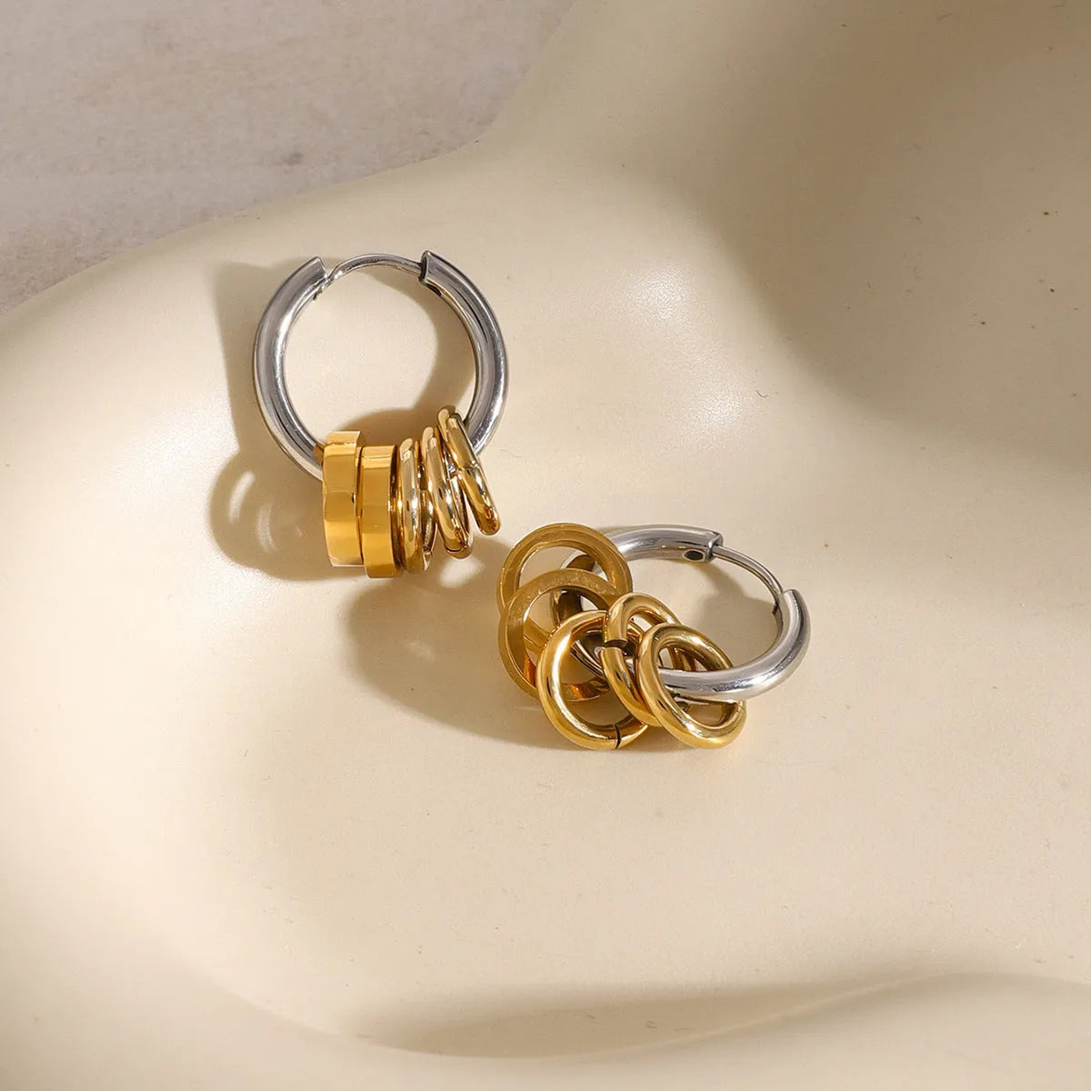 Pair of unisex stainless steel earrings with electroplated finish in ins style
