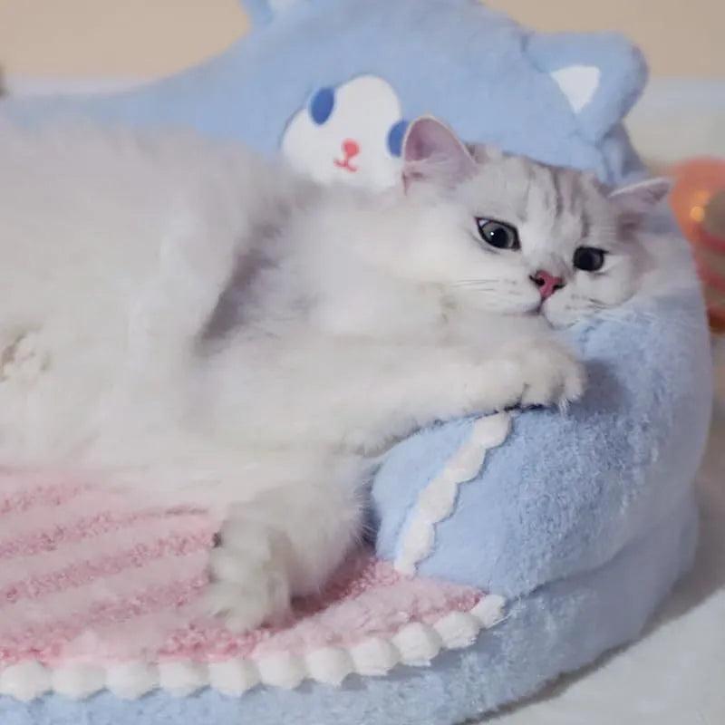 Washable cat bed with high backrest, removable cushion, and non-slip bottom in brown or pink