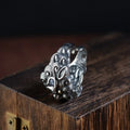 Silver open style ring showing Domineering Jibeast pattern with zodiac animal modelling