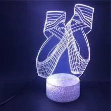 Ballet dancer shaped 3D LED night light with colourful illumination on an ABS base, featuring remote control.