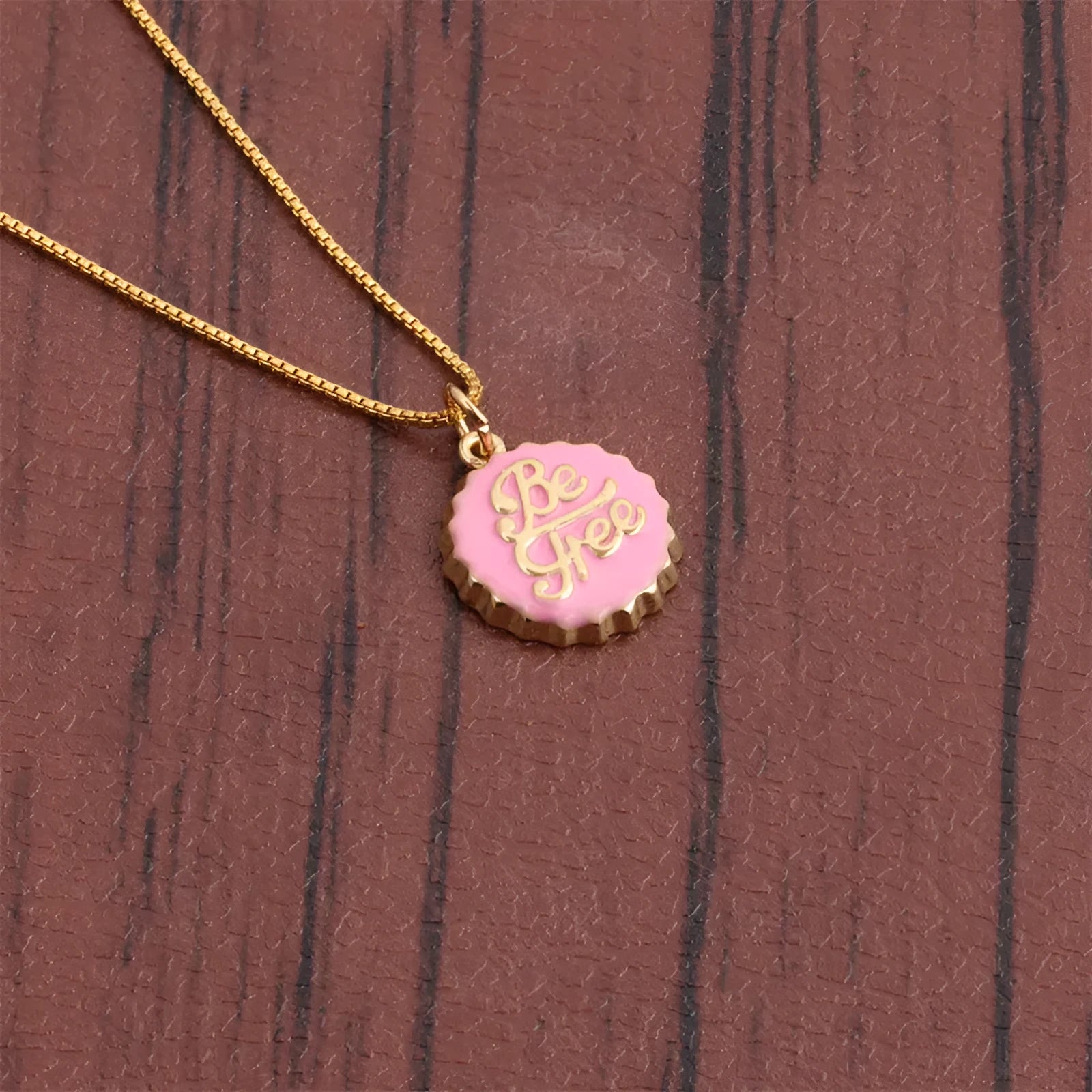 Copper bottle cap pendant necklace with 18K gold electroplating on a 40cm box chain.