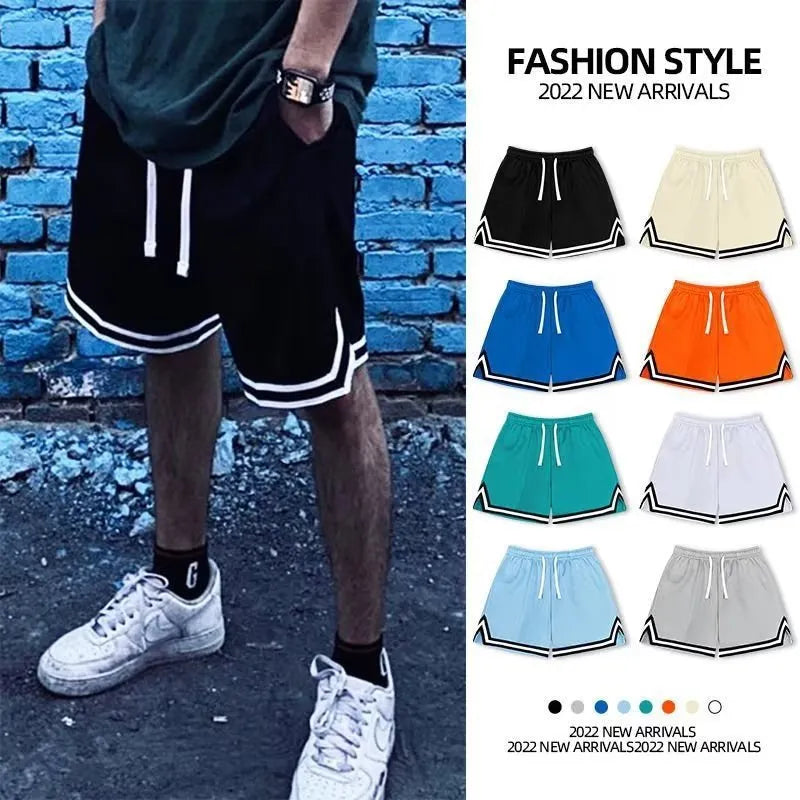 Men's elastic polyester sports shorts in multiple colour options with loose fit design