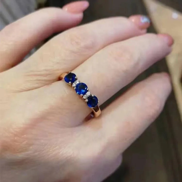 Blue stone ring with adjustable opening, purple and rose gold electroplated copper, geometric live head style