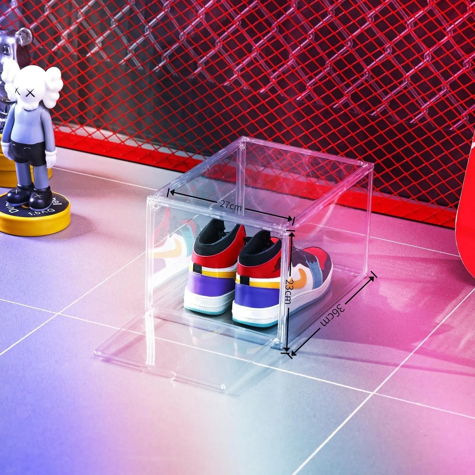Clear acrylic shoe storage box with magnetic side door showing visible shoe organisation
