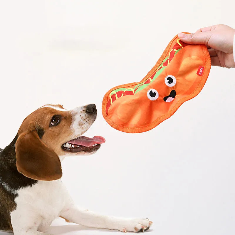 Food-shaped crinkle and squeaky dog toy in hamburger, fries, hot dog, or pizza design for interactive play.