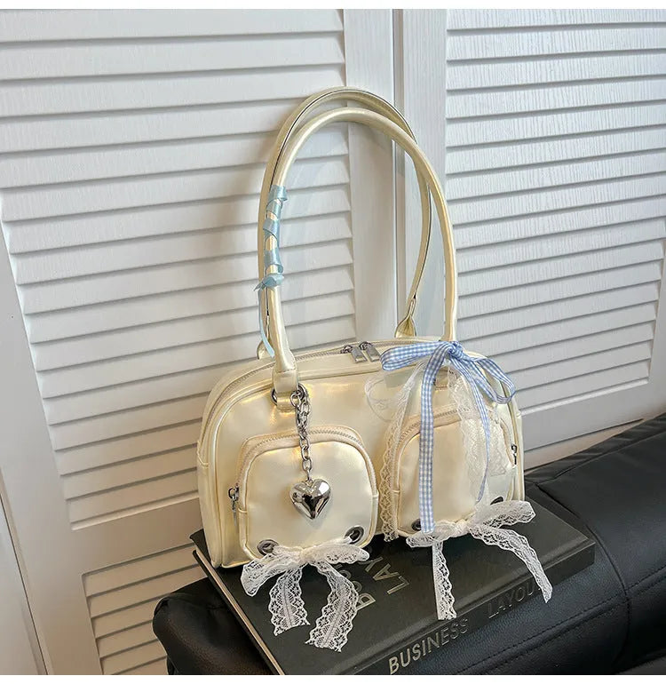 Soft PU leather casual shoulder bag with crossbody strap and internal phone compartment in beige colour