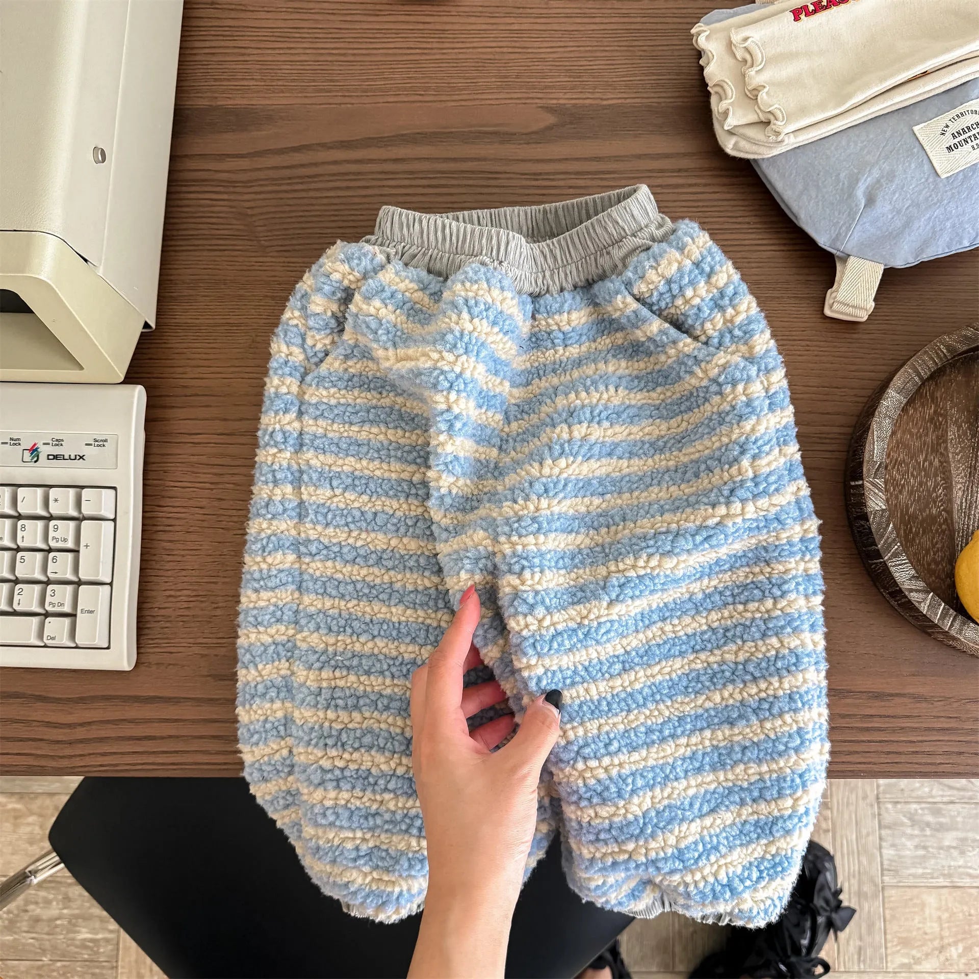 Children's unisex fleece-lined high-waist harem pants in creamy blue stripes with elastic waistband for winter