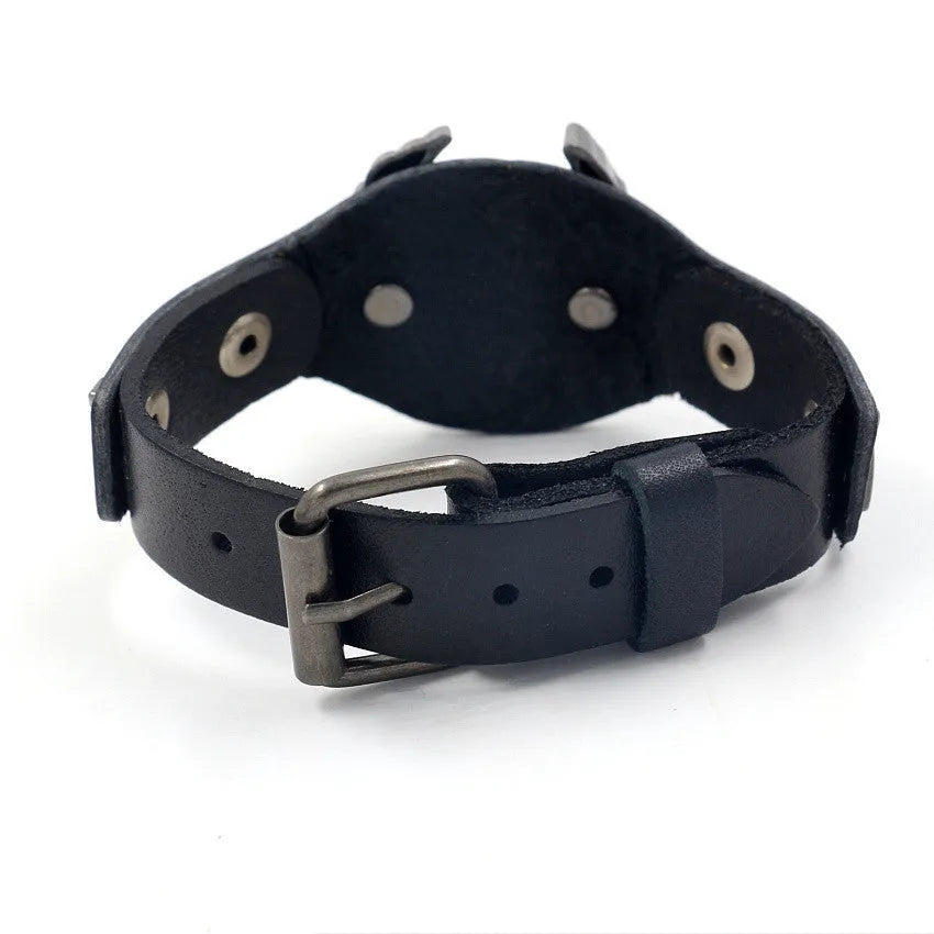 Black geometric leather bracelet with an alloy eagle watch-buttom hardware detail.