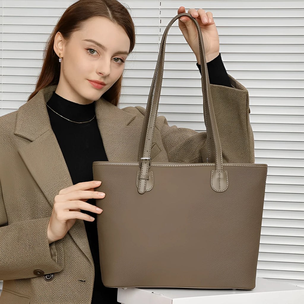 Genuine leather women's retro tote bag in dark grey showing internal zipper and phone pockets