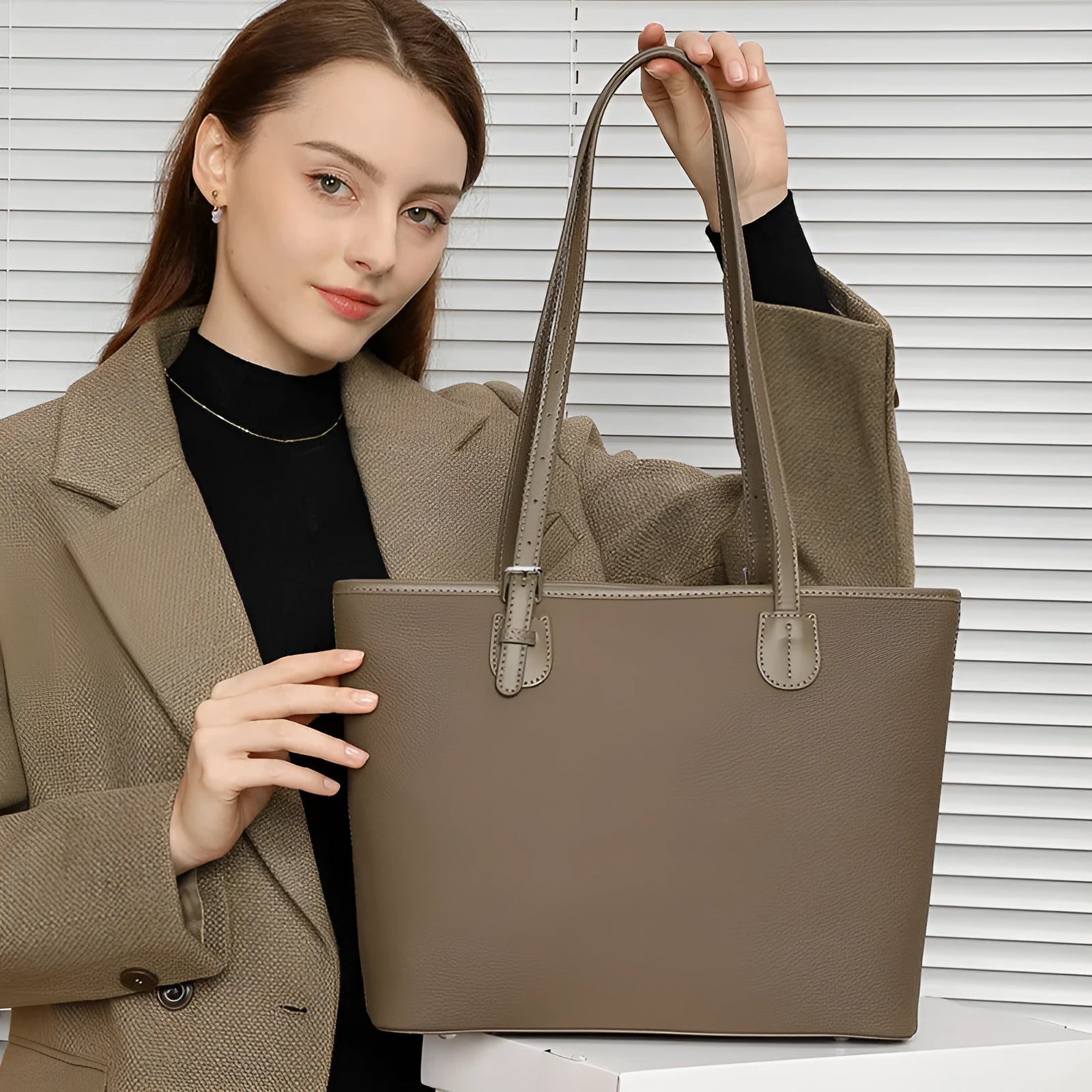 Genuine leather women's retro tote bag in dark grey showing internal zipper and phone pockets