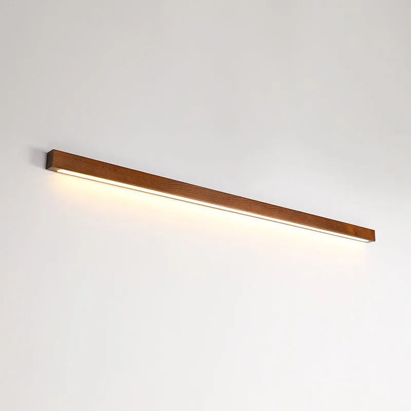 Walnut-coloured minimalist log strip wall lamp with wood and acrylic construction in three length options