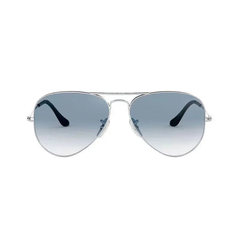 Tempered glass sunglasses with a choice of gold, silver, or black frames and dark green or blue gradient lenses.