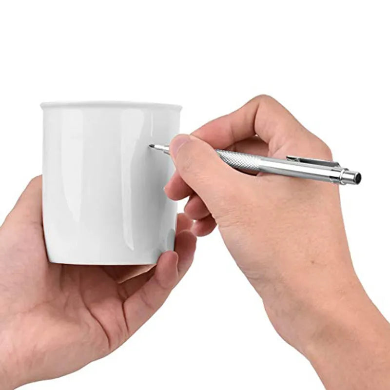 Silver aluminum glass marking pen with tungsten carbide tip on white background