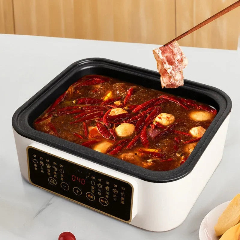 28-litre electric kitchen steamer with stainless steel rack on countertop